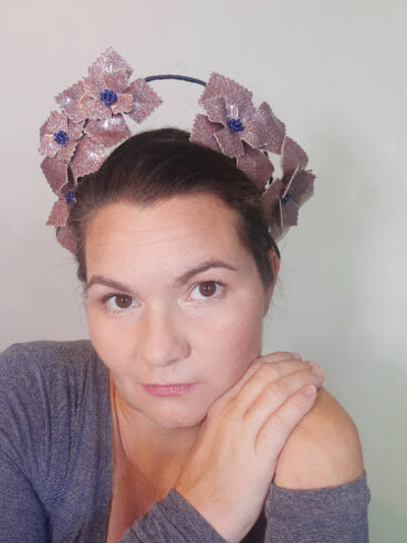 A picture of a pink and navy millinery crown by Melissa Rath Millinery.