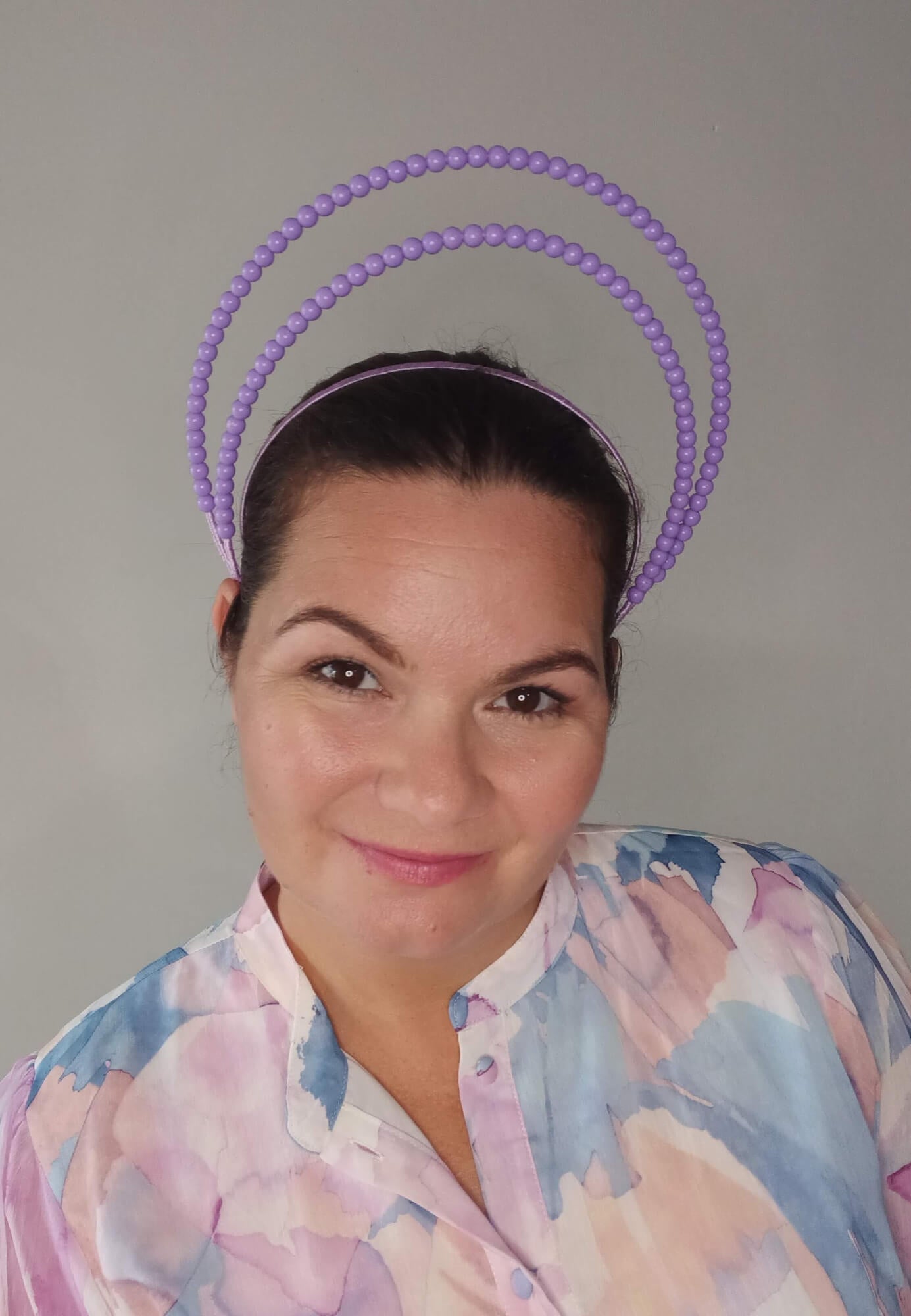 A picture of a Purple Beaded Millinery Headband by Melissa Rath Millinery.