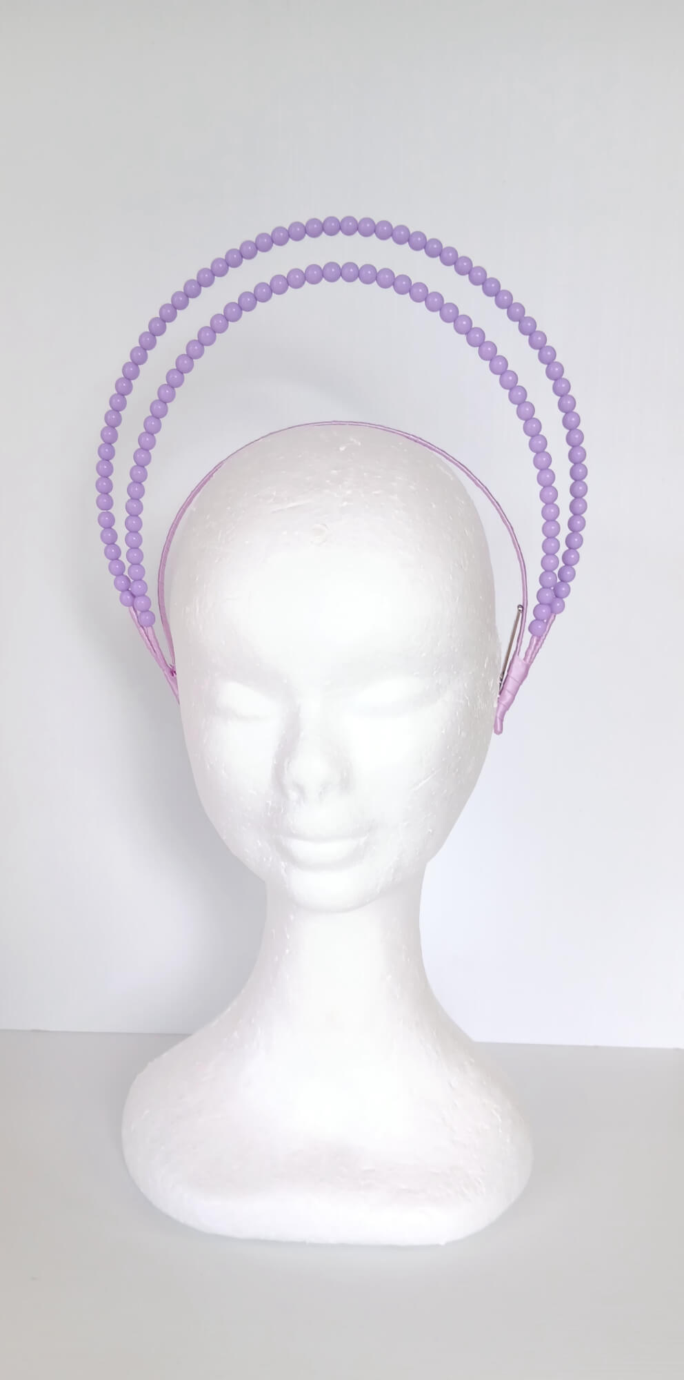 A picture of a Purple Beaded Millinery Headband by Melissa Rath Millinery.