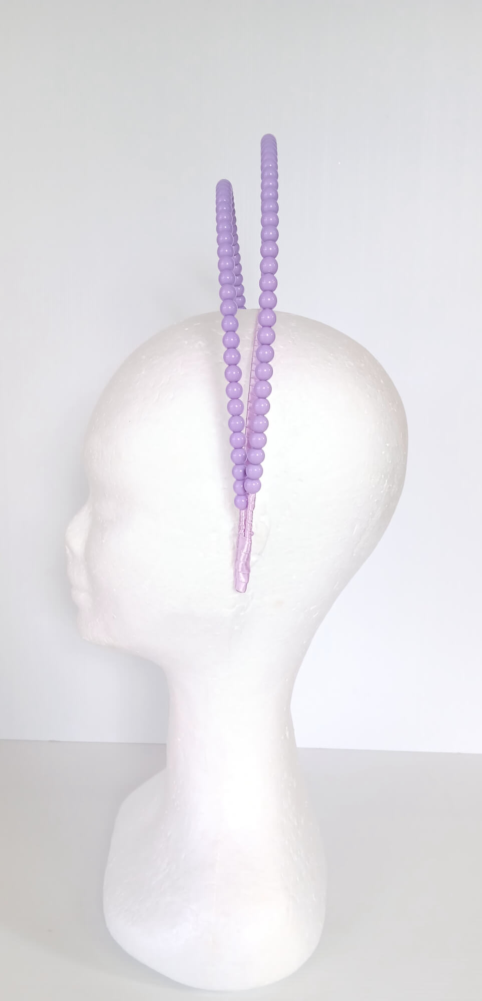 A picture of a Purple Beaded Millinery Headband by Melissa Rath Millinery.