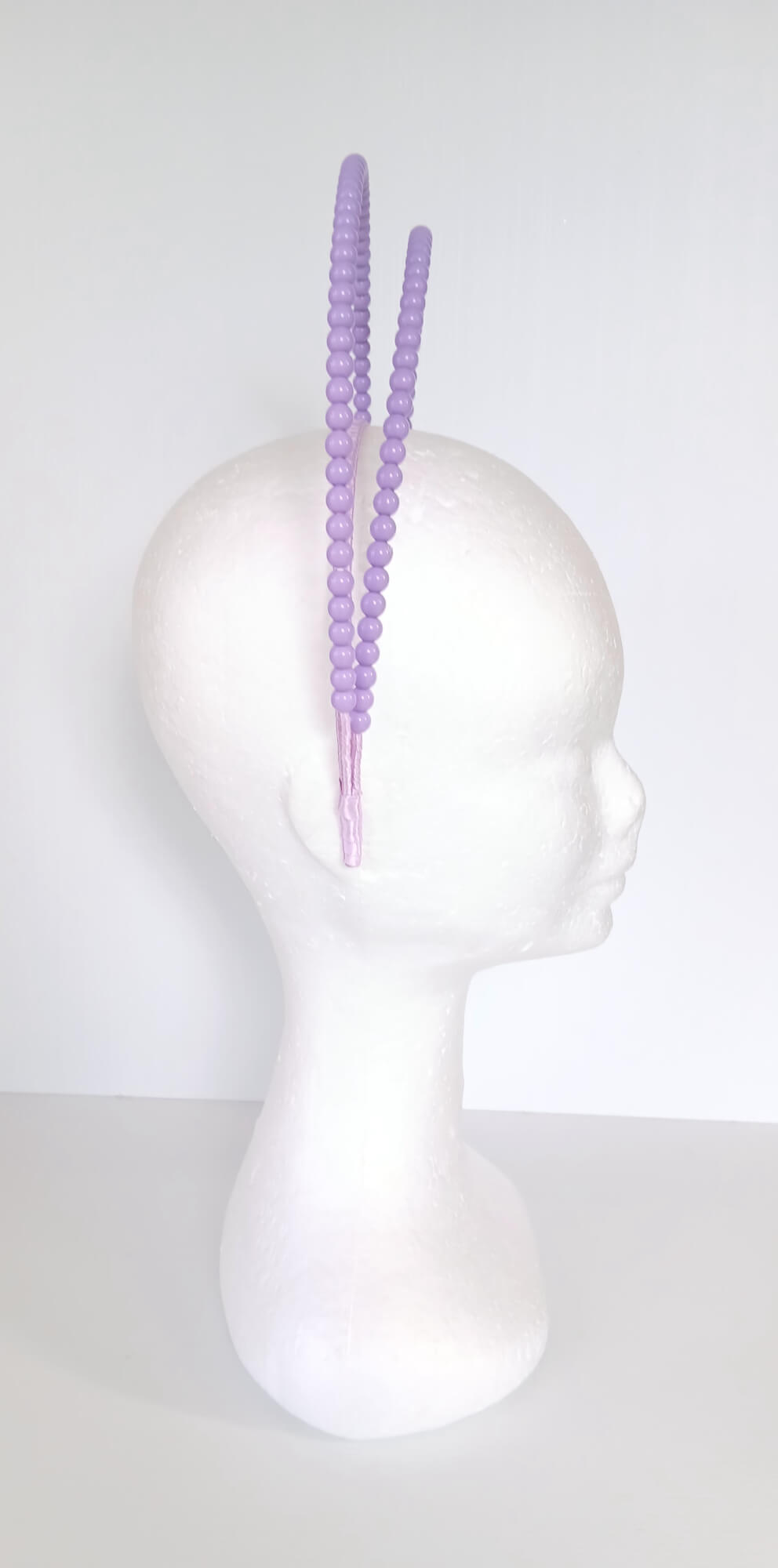 A picture of a Purple Beaded Millinery Headband by Melissa Rath Millinery.