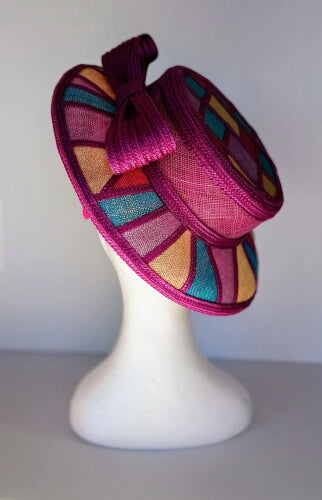A picture of a Purple Patchwork Boater Hat by Melissa Rath Millinery.