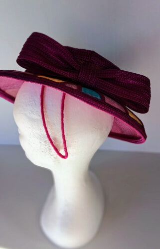 A picture of a Purple Patchwork Boater Hat by Melissa Rath Millinery.