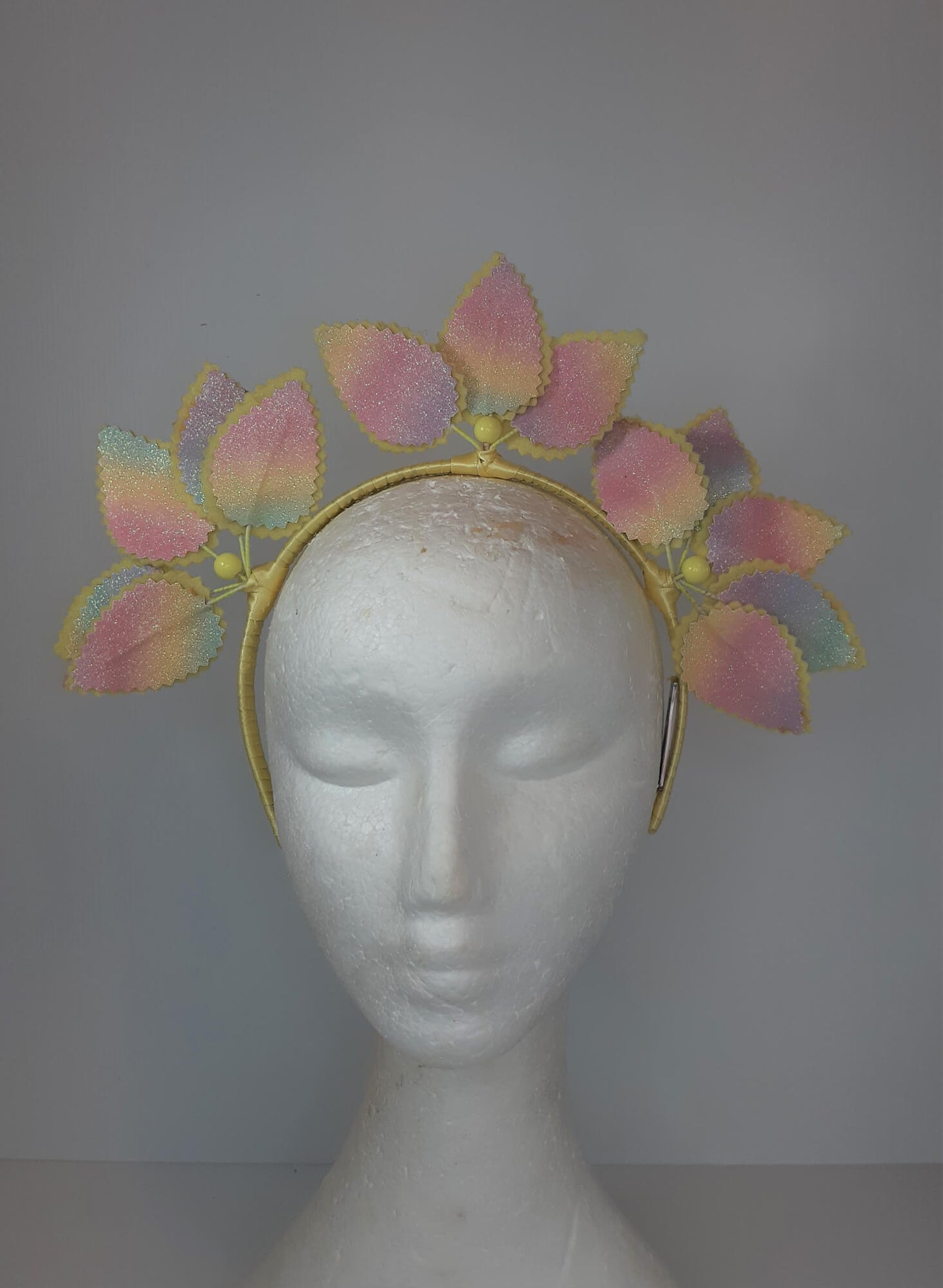 A picture of a Rainbow Pleather Millinery Headband by Melissa Rath Millinery.