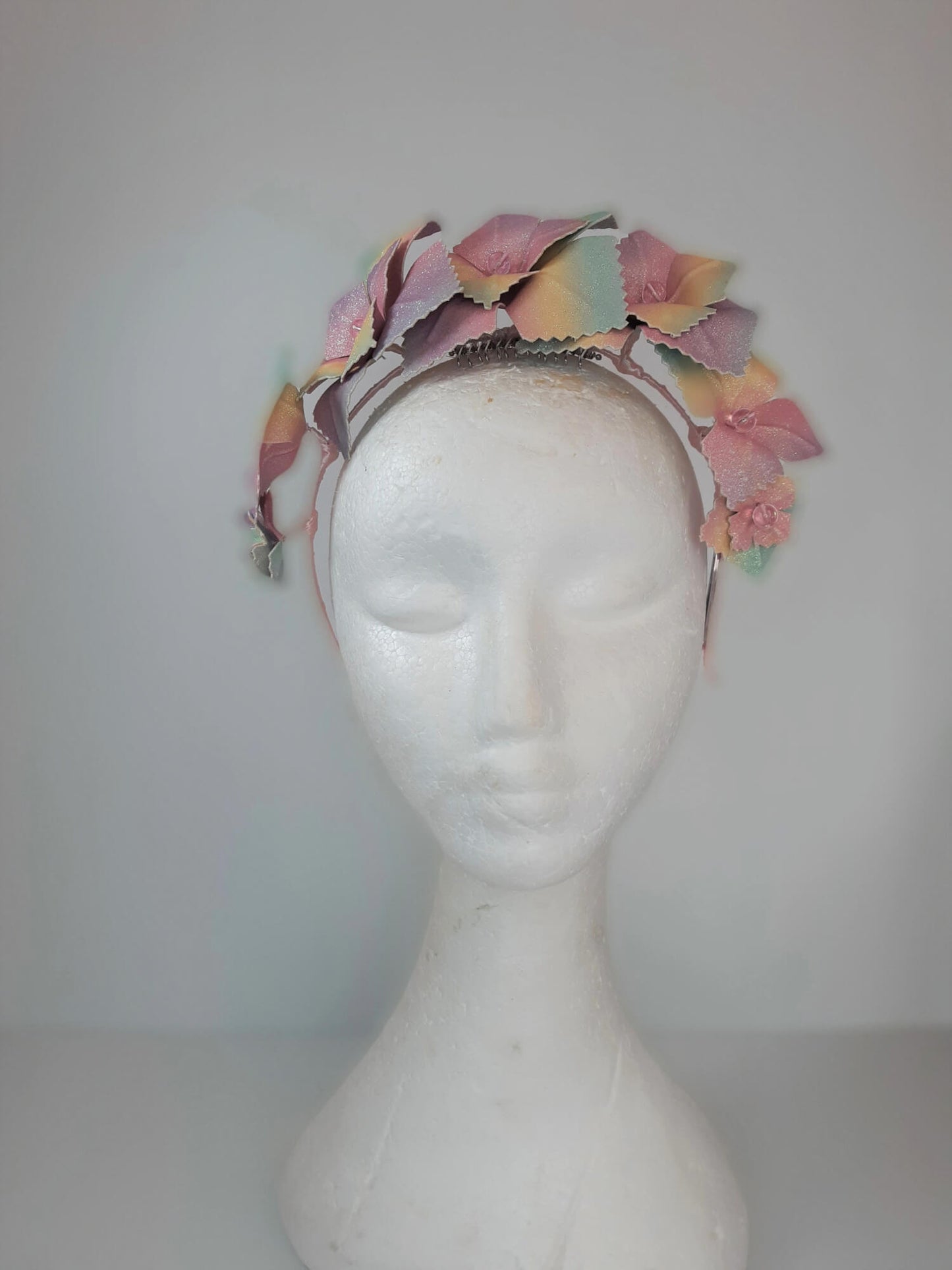 A picture of a Rainbow Pleather Millinery Crown by Melissa Rath Millinery.