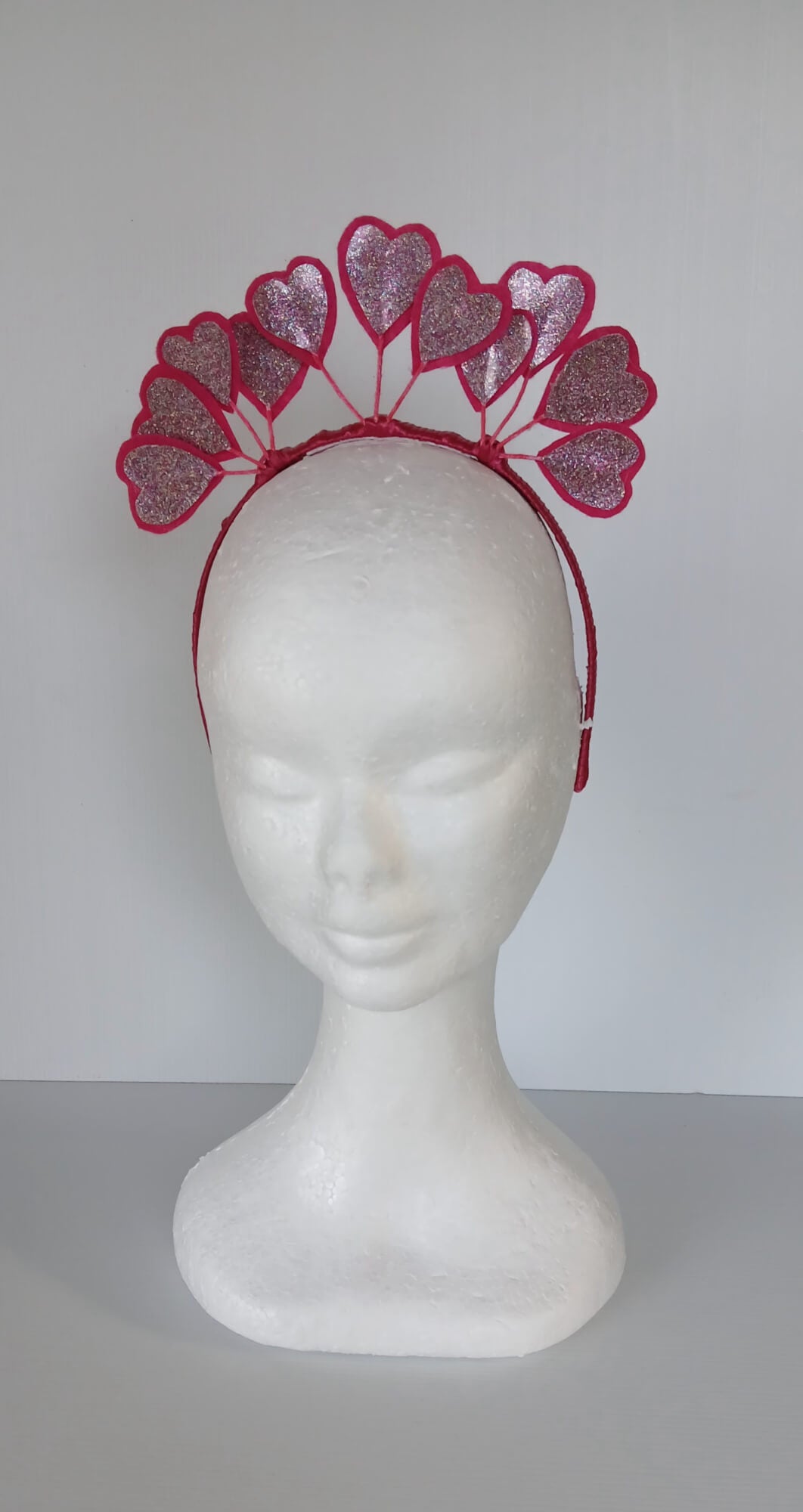 A picture of a red heart headband in pleather and felt by Melissa Rath Millinery