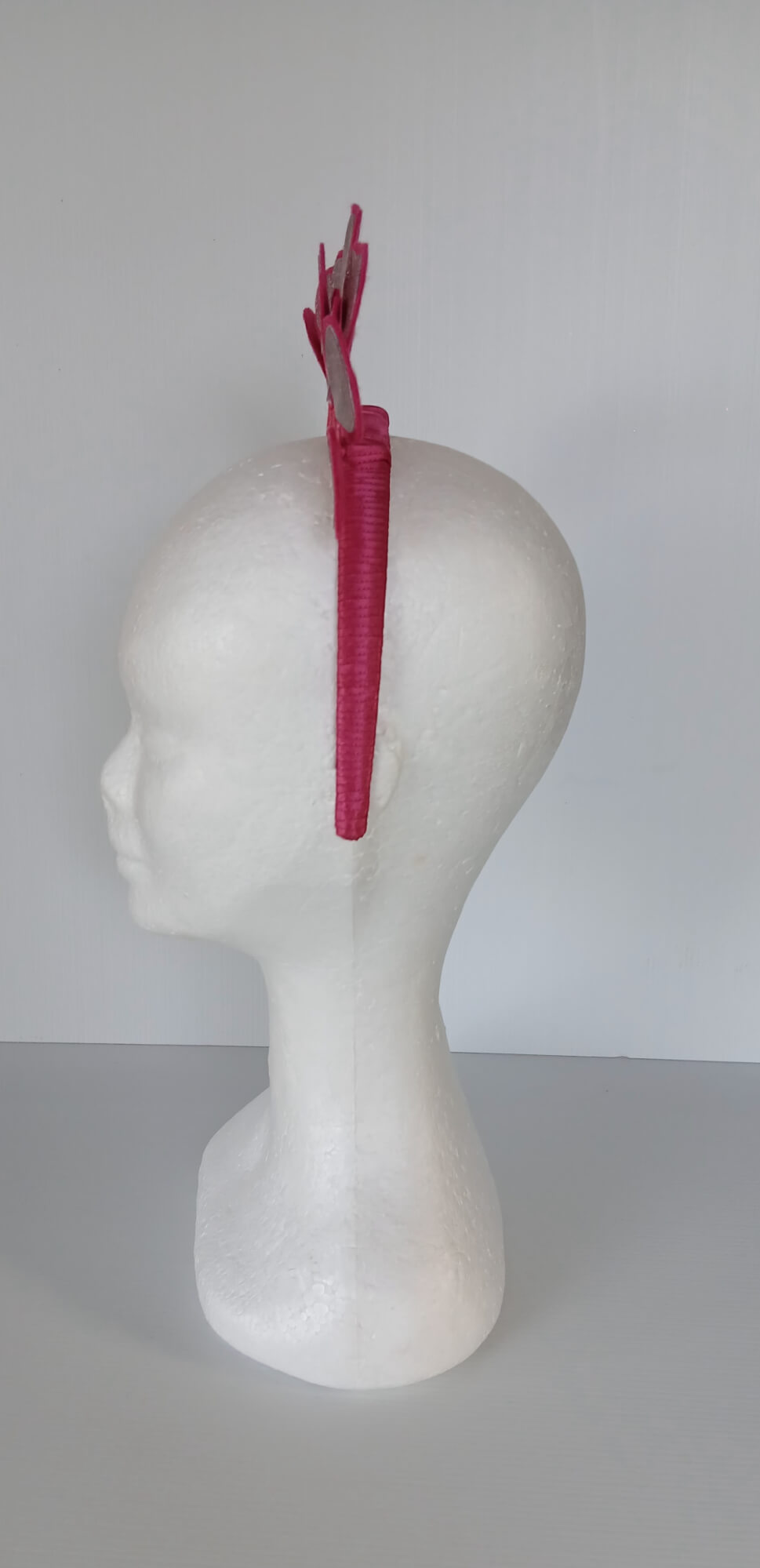 A picture of a red heart headband in pleather and felt by Melissa Rath Millinery