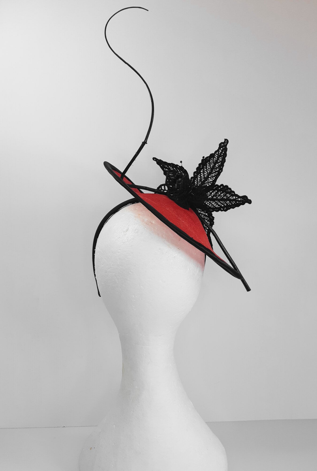 A picture of a Red and Black Saucer Hat by Melissa Rath Millinery
