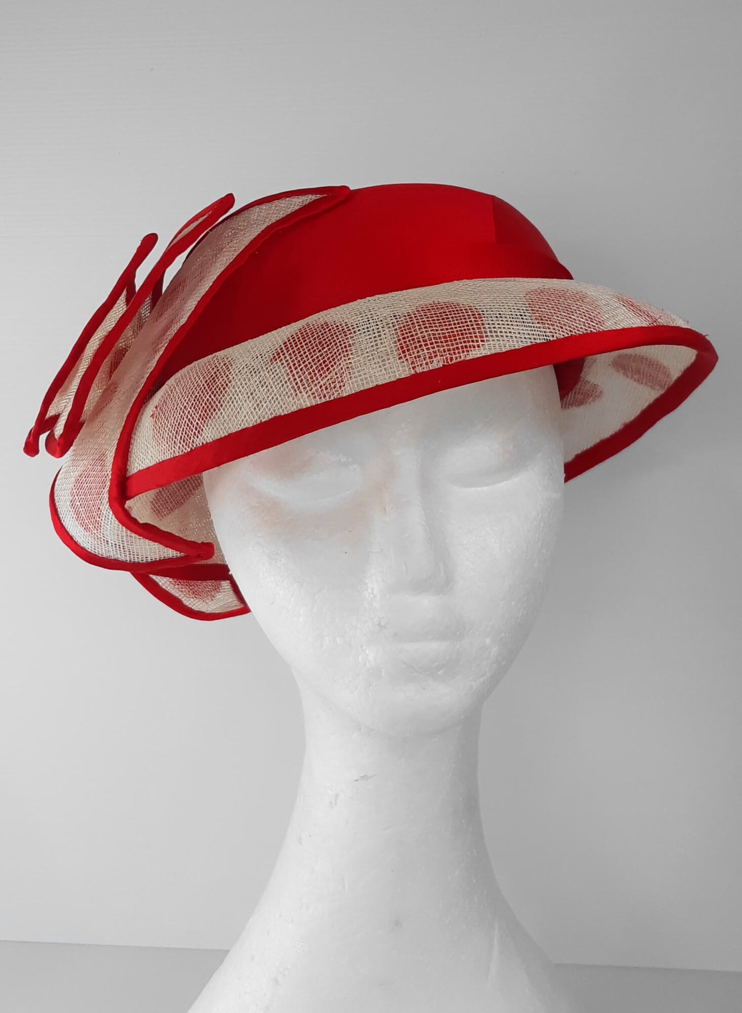 A picture of a Red and White Hat by Melissa Rath Millinery