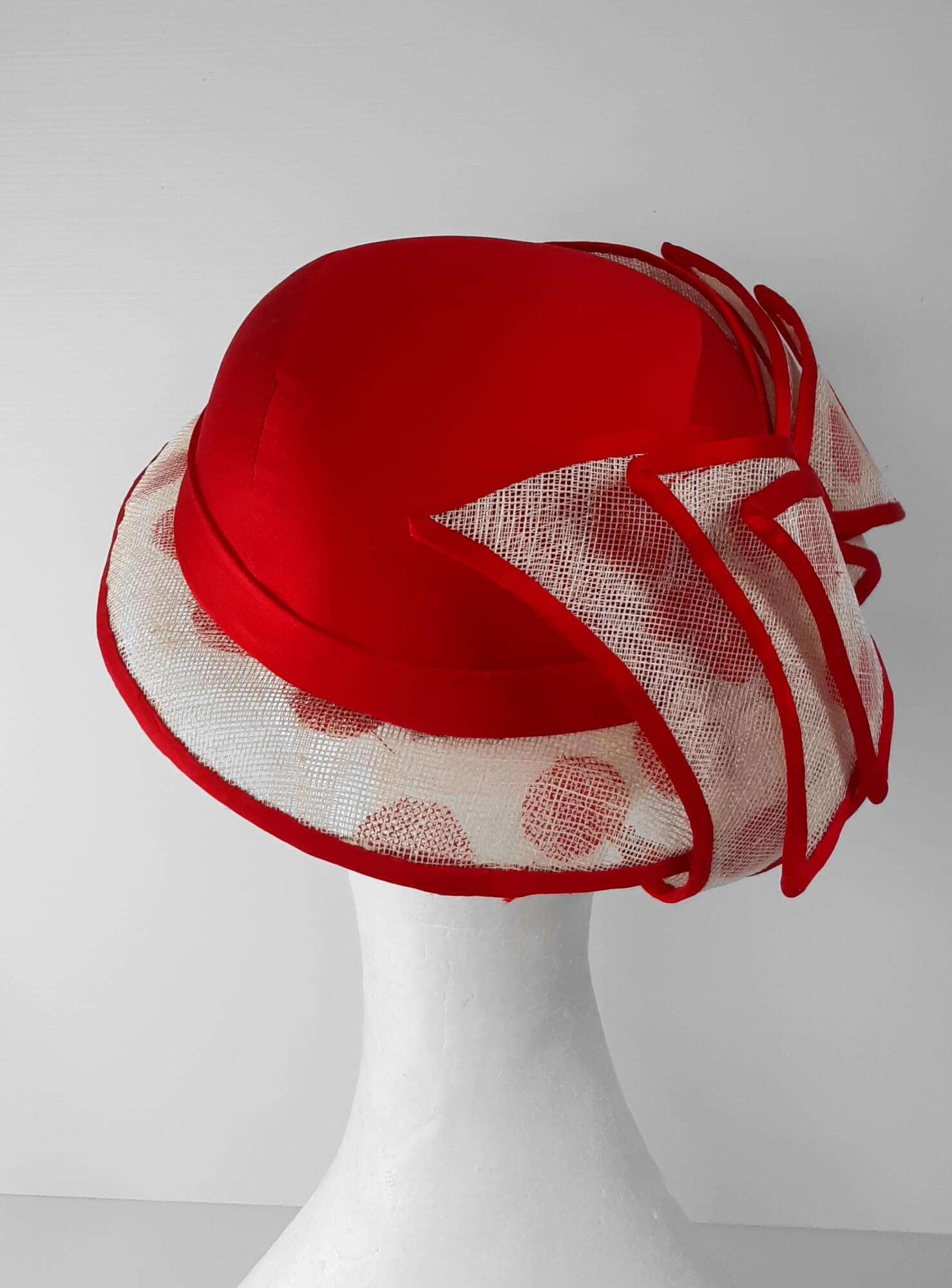 A picture of a Red and White Hat by Melissa Rath Millinery
