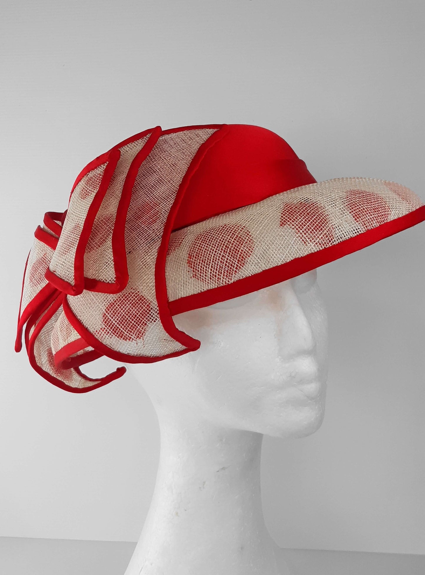 A picture of a Red and White Hat by Melissa Rath Millinery