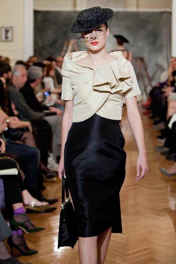 A picture of a model on the catwalk for Vassilis Emmanuel Zoulias 2011.