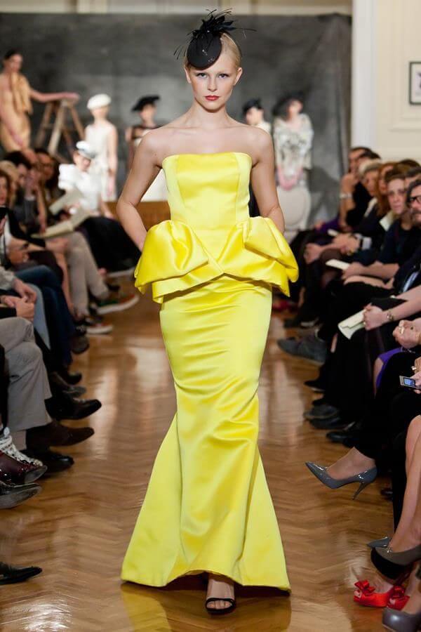 A picture of a model on the catwalk for Vassilis Emmanuel Zoulias 2011.