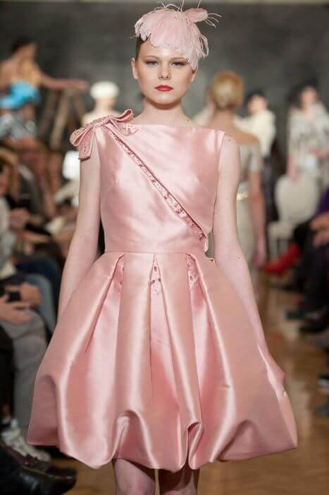 A picture of a model on the catwalk for Vassilis Emmanuel Zoulias 2011.
