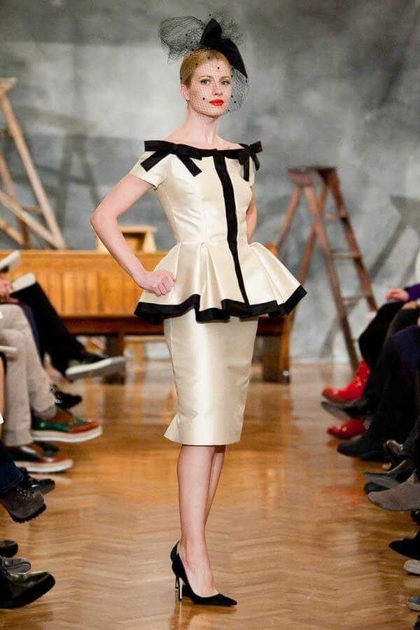A picture of a model on the catwalk for Vassilis Emmanuel Zoulias 2011.