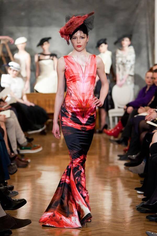 A picture of a model on the catwalk for Vassilis Emmanuel Zoulias 2011.