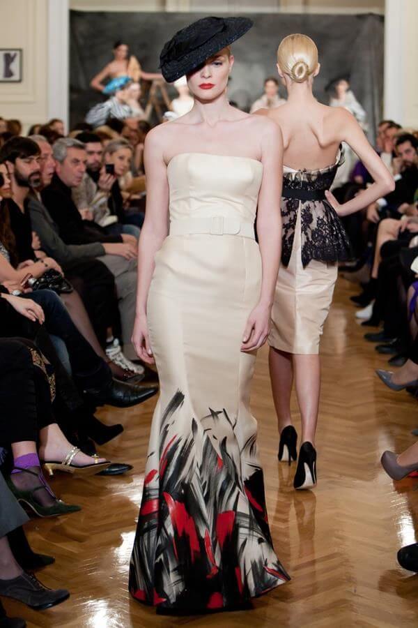 A picture of a model on the catwalk for Vassilis Emmanuel Zoulias 2011.