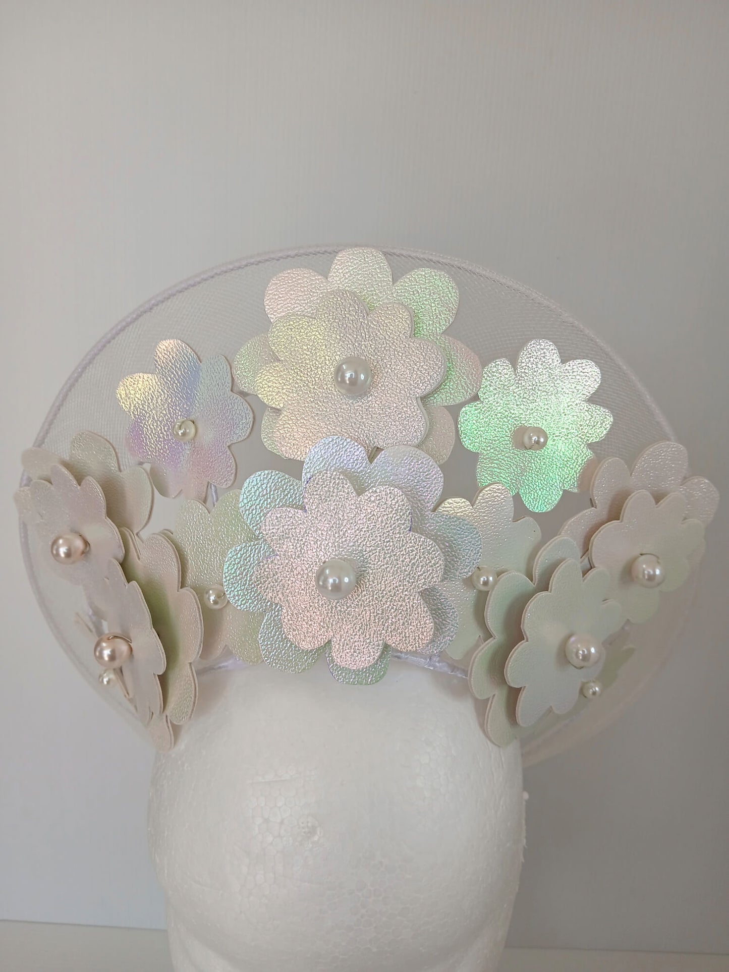 A picture of a White Pleather and Crinoline Millinery Halo Crown by Melissa Rath Millinery.