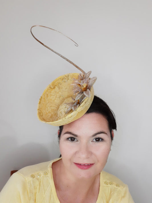 A picture of a Yellow Millinery Saucer Hat by Melissa Rath Millinery.