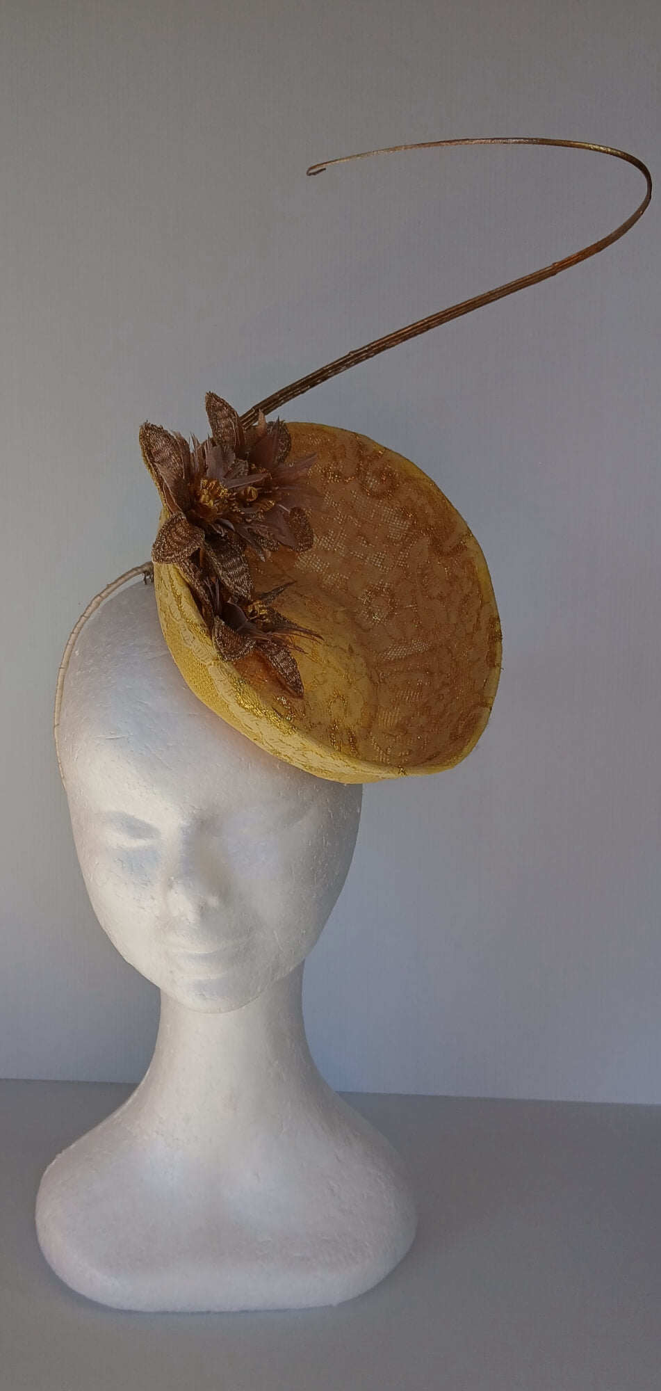 A picture of a Yellow Millinery Saucer Hat by Melissa Rath Millinery.