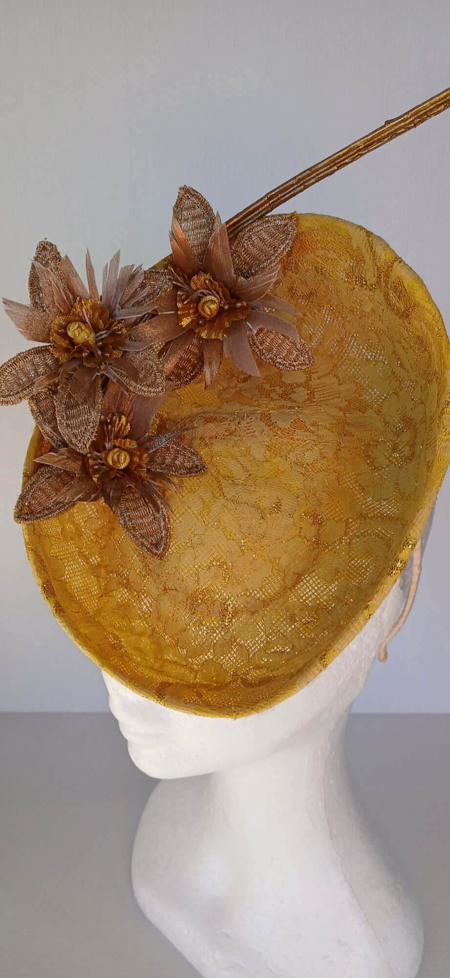 A picture of a Yellow Millinery Saucer Hat by Melissa Rath Millinery.