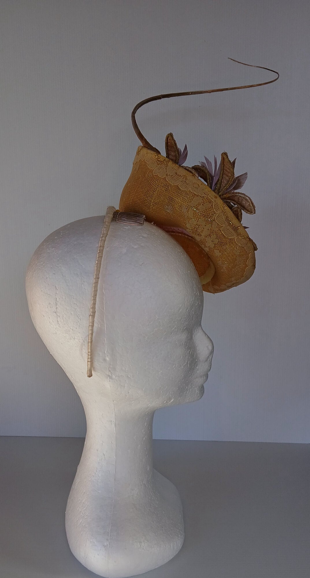 A picture of a Yellow Millinery Saucer Hat by Melissa Rath Millinery.