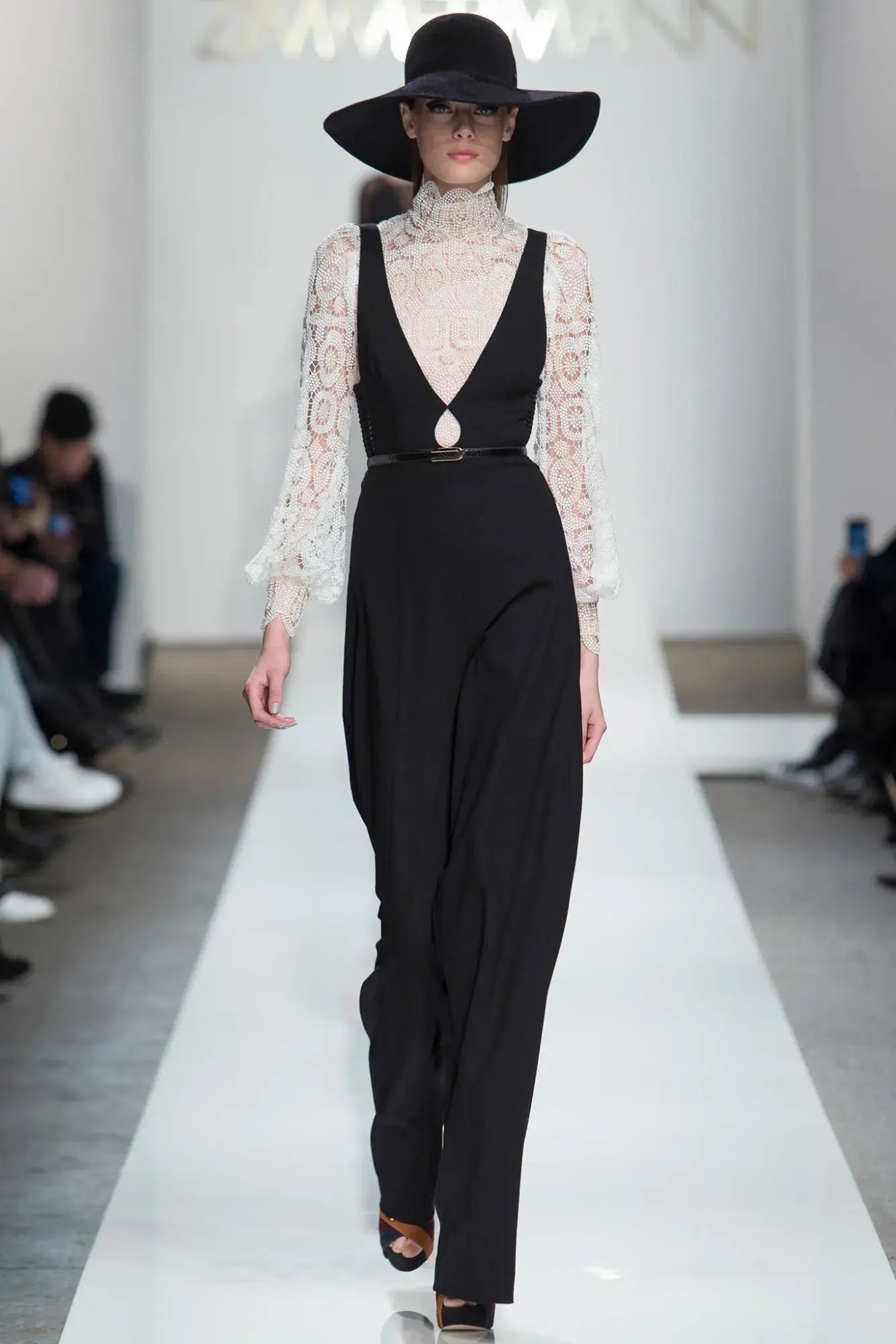 A picture of a model on the catwalk for Zimmerman AW 2015.