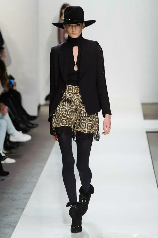 A picture of a model on the catwalk for Zimmerman AW 2015.