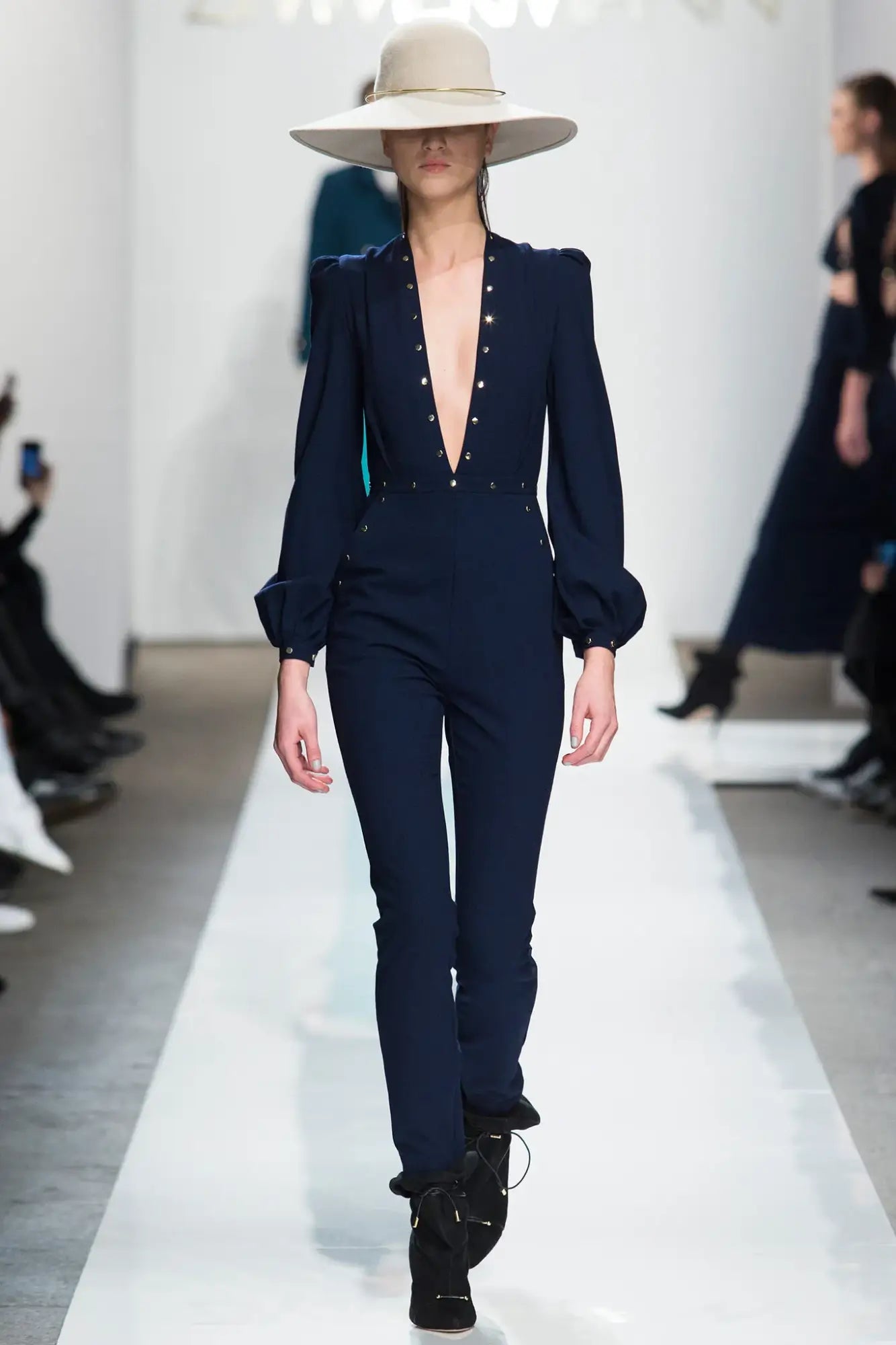 A picture of a model on the catwalk for Zimmerman AW 2015.