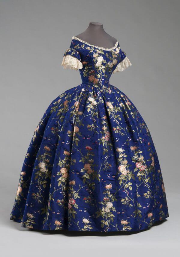 A navy blue silk brocade top,skirt and petticoat