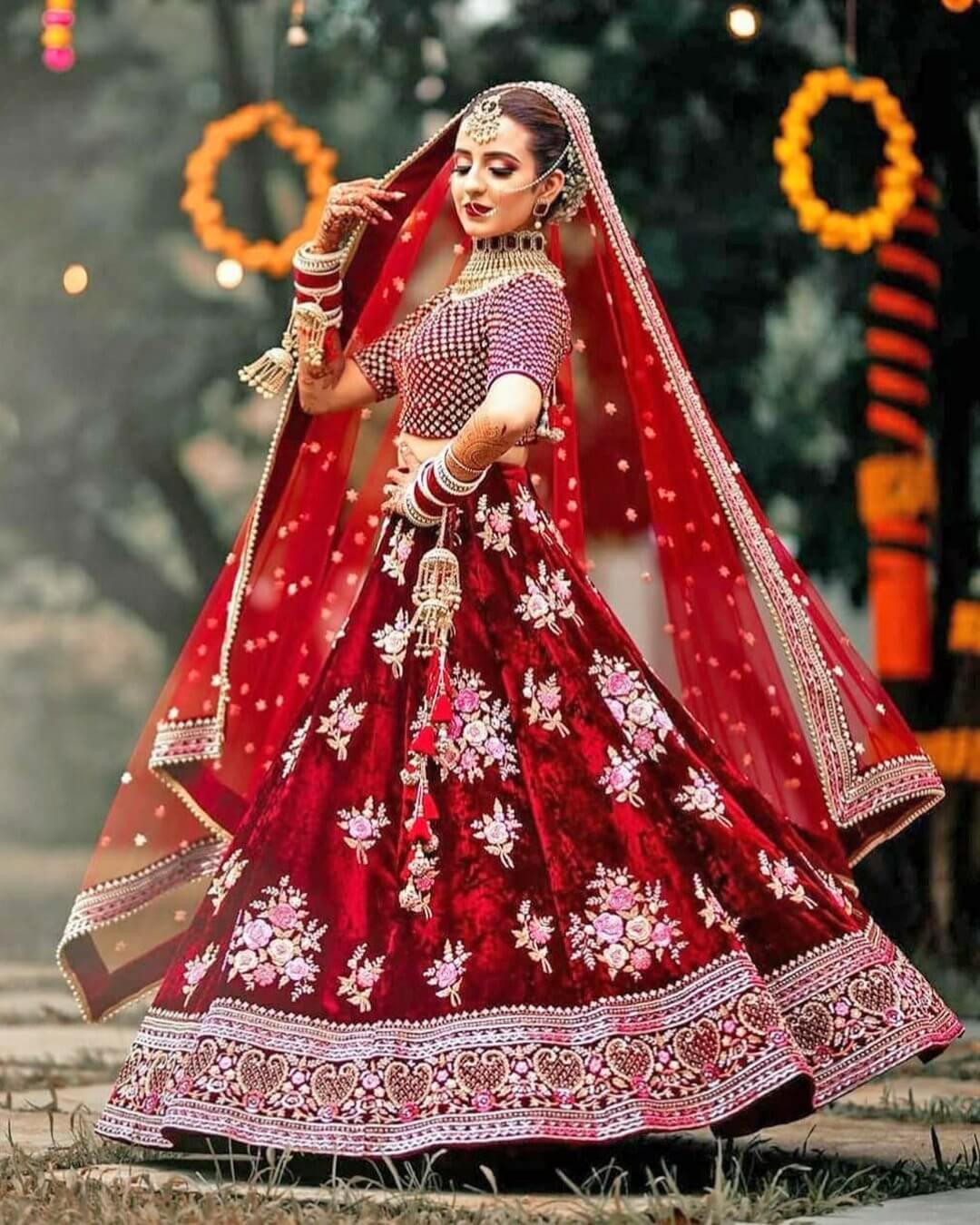 A picture of a bride in traditional Indian wedding attire.