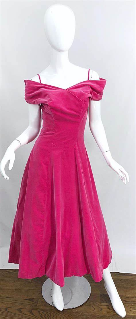 A picture of a design by Elsa Schiaparelli in "Shocking Pink" from 1950.