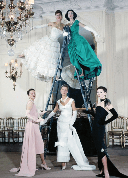 A picture of models posing in Christian Dior.