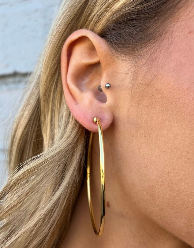 A picture of Alessia Hoop Earrings by Izoa, available at The Iconic.