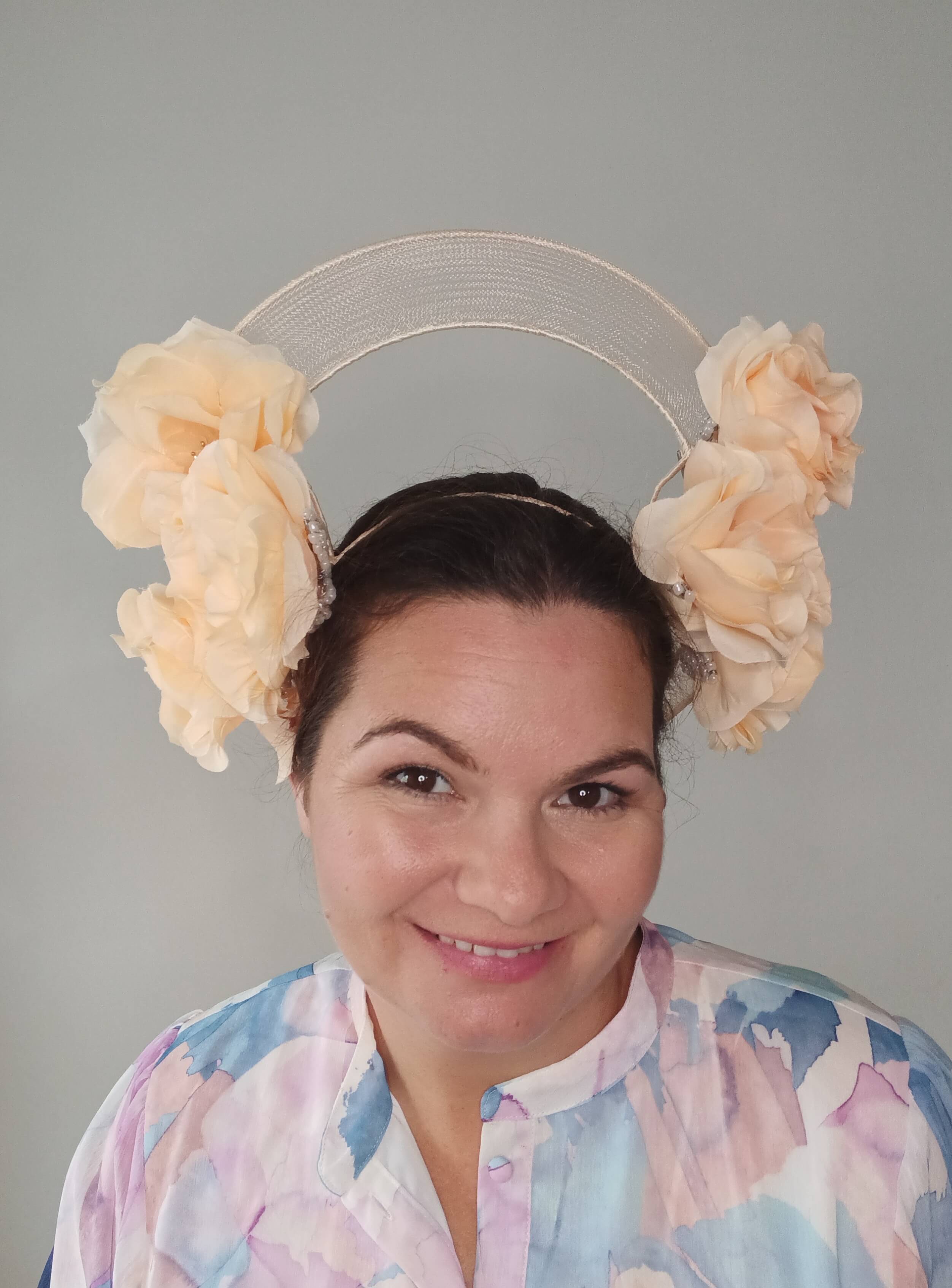 A picture of an Apricot Crinoline Millinery Crown by Melissa Rath Millinery.