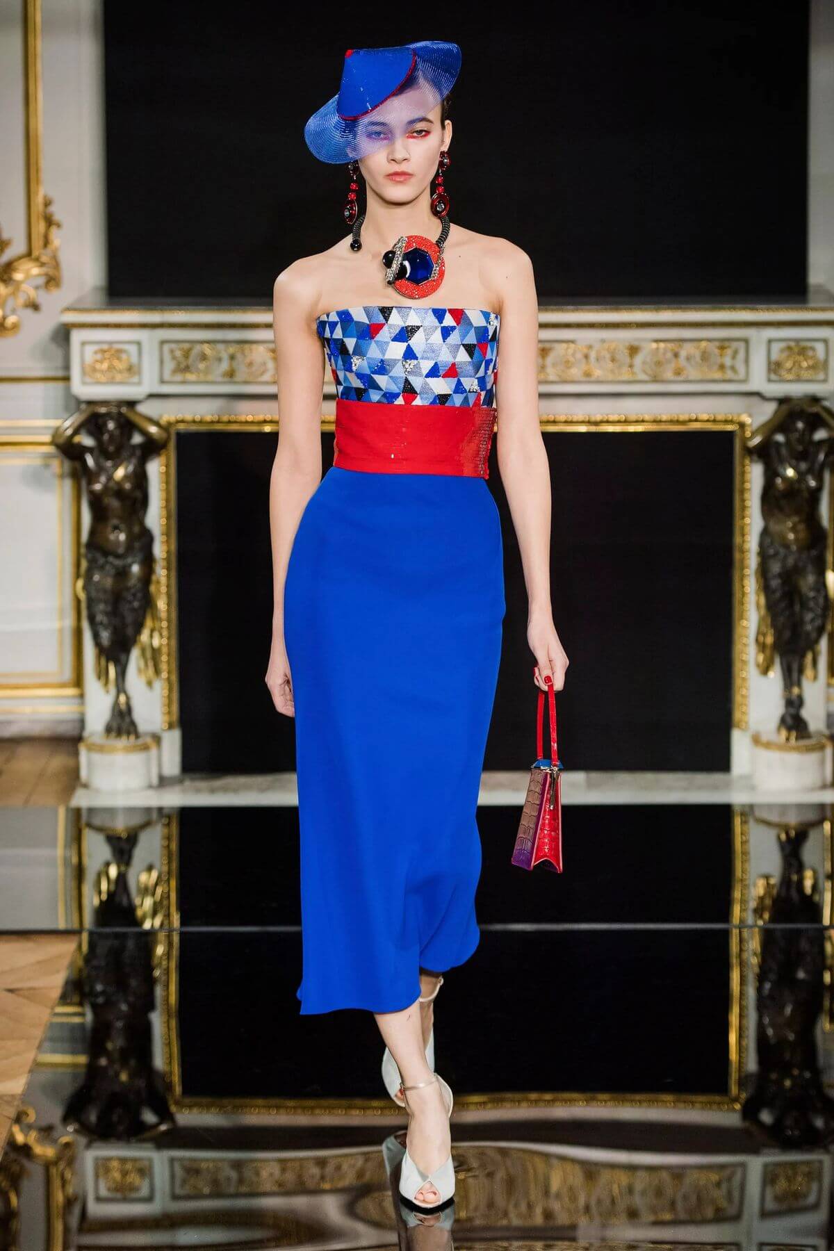 A picture of a model on the catwalk for the Armani 2019 catwalk show.