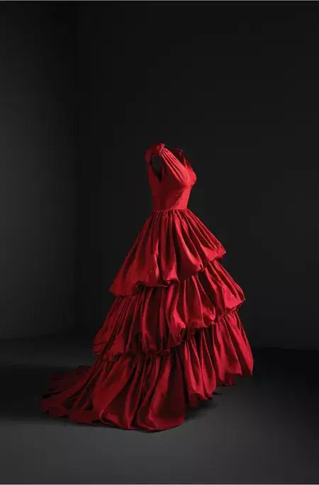 A picture of a red gown by Spanish designer Balenciaga