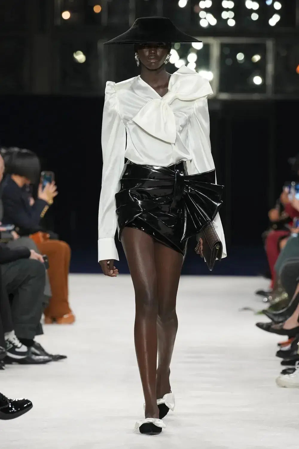 A picture of a catwalk model in the Balmain Fall Winter 2023/2024 show.