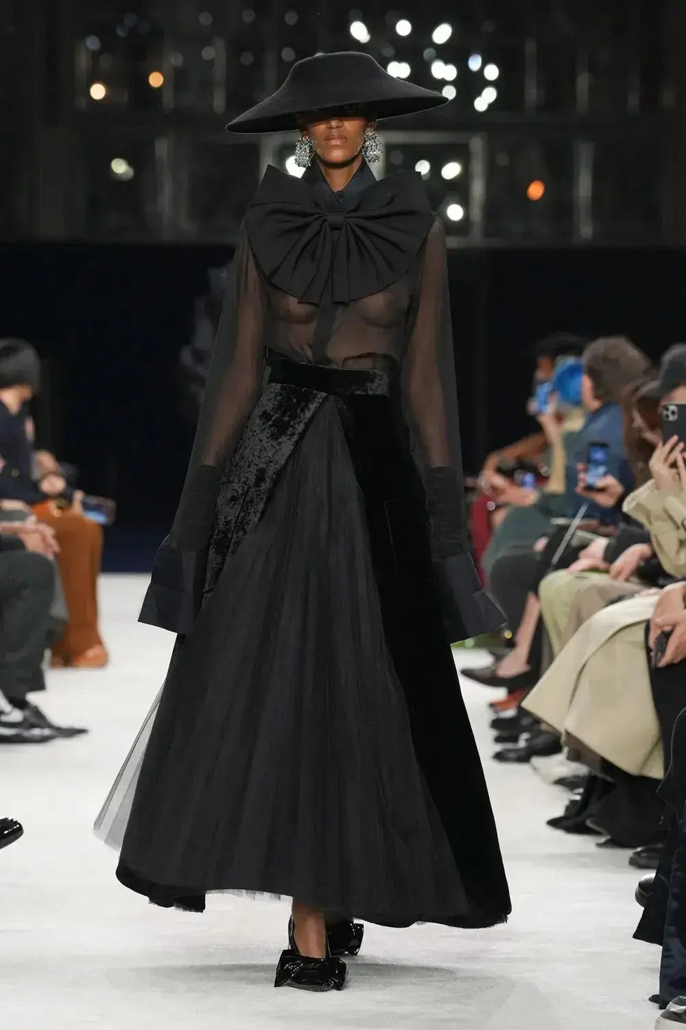A picture of a catwalk model in the Balmain Fall Winter 2023/2024 show.