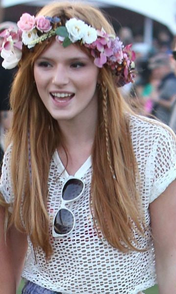 A picture of Bella Thorne wearing a crown at the Coachella.