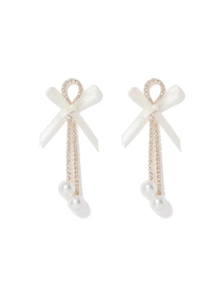 A picture of the Betty Bow Chain Earrings by Forever New