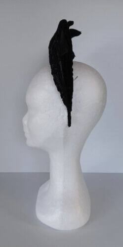 A picture of a Black Lace Millinery Crown by Melissa Rath Millinery.