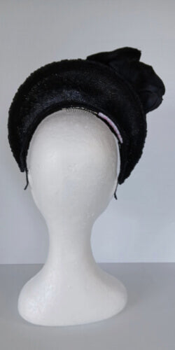 A picture of a Black Lace Millinery Crown by Melissa Rath Millinery.
