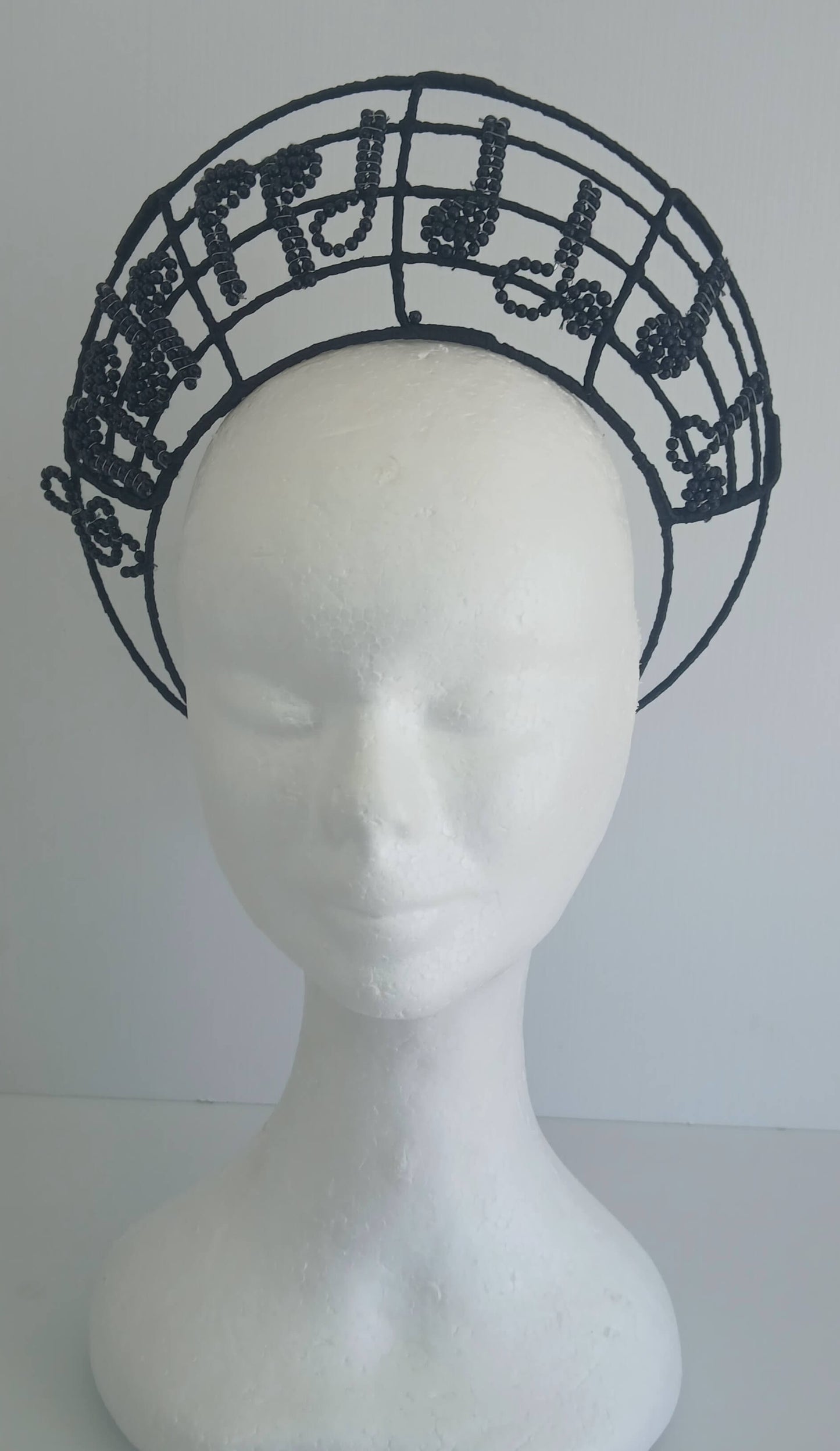An image of the Black Musical Crown by Melissa Rath Millinery