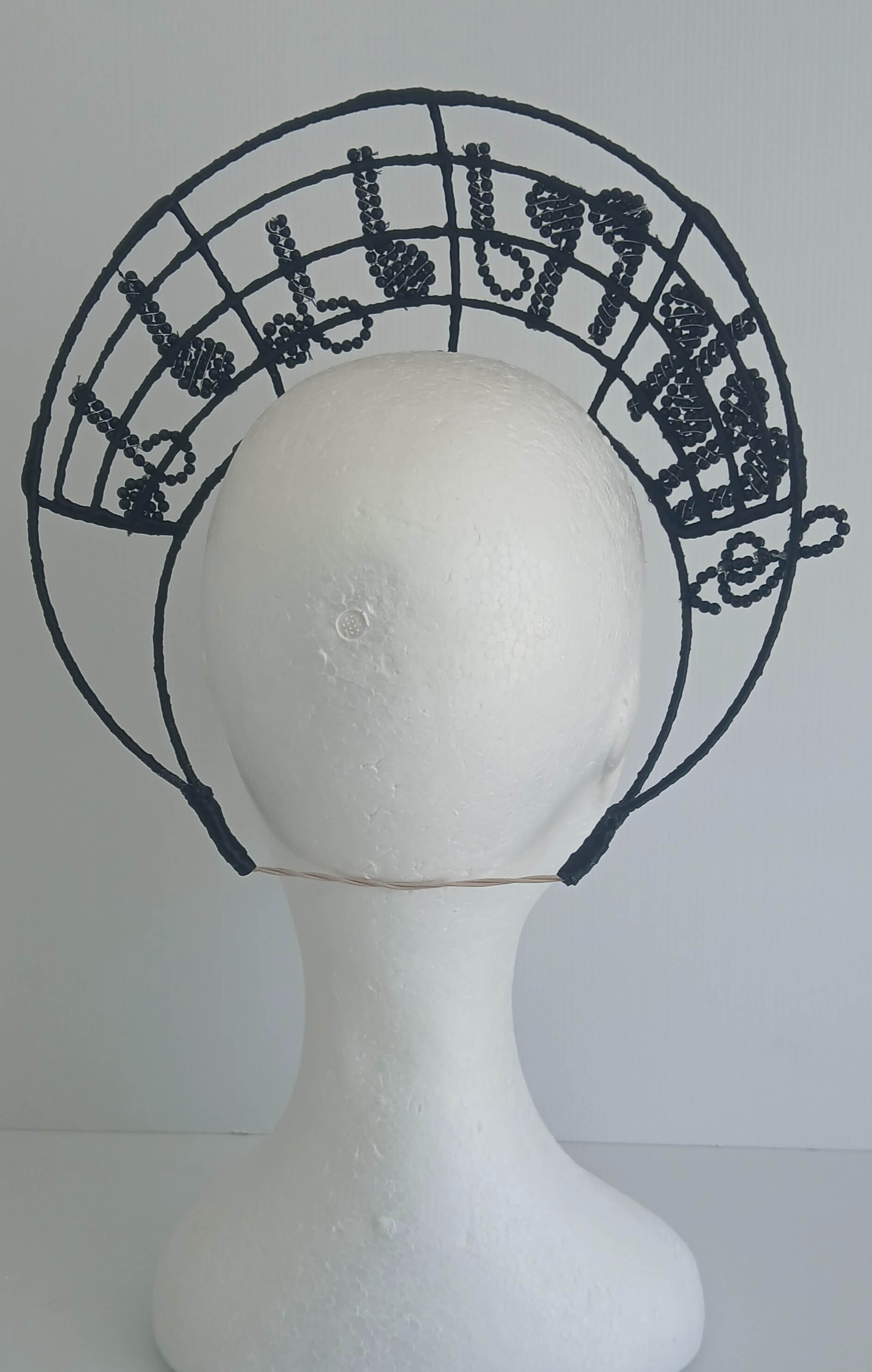 An image of the Black Musical Crown by Melissa Rath Millinery