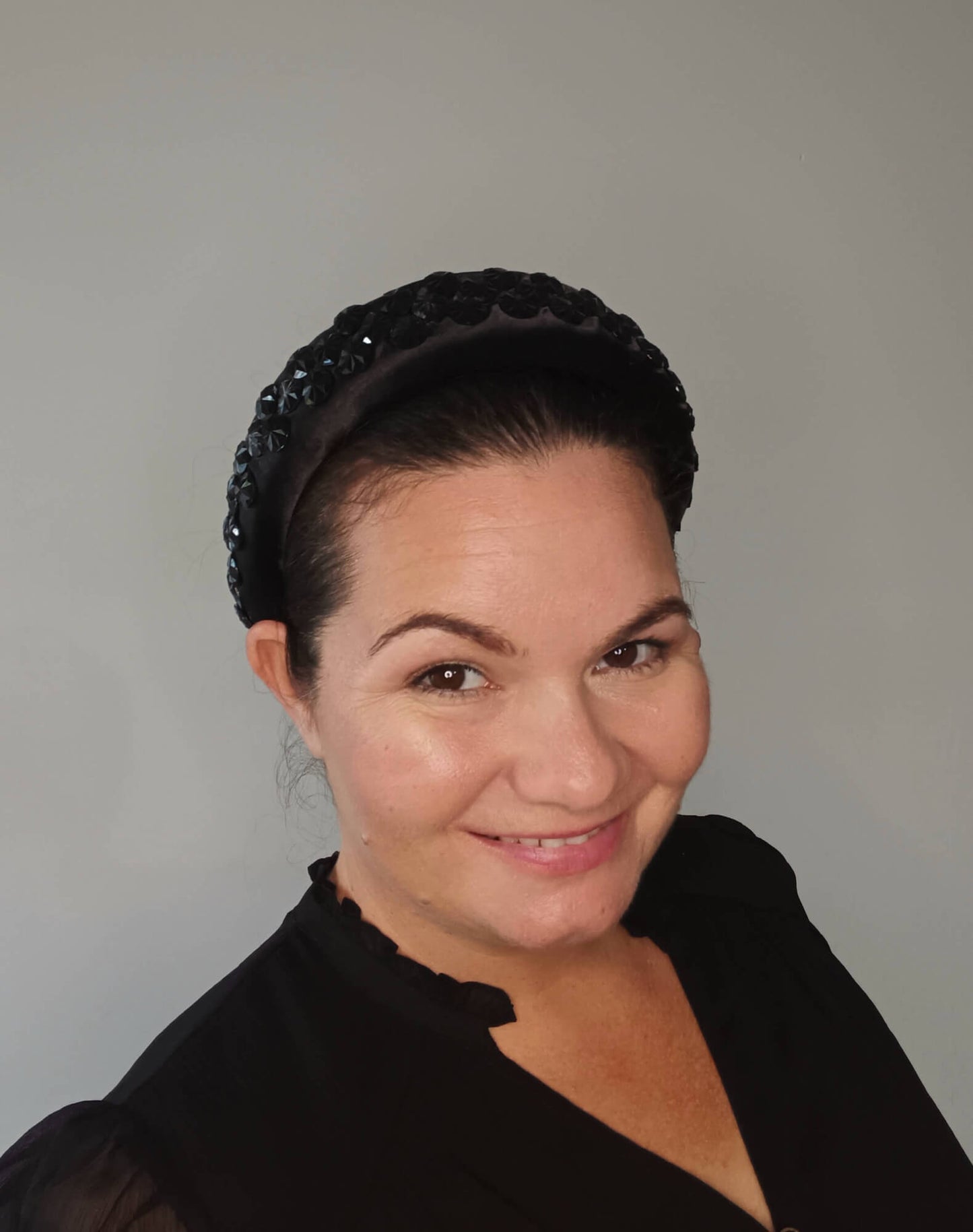 A picture of a Black Padded Headband by Melissa Rath Millinery.
