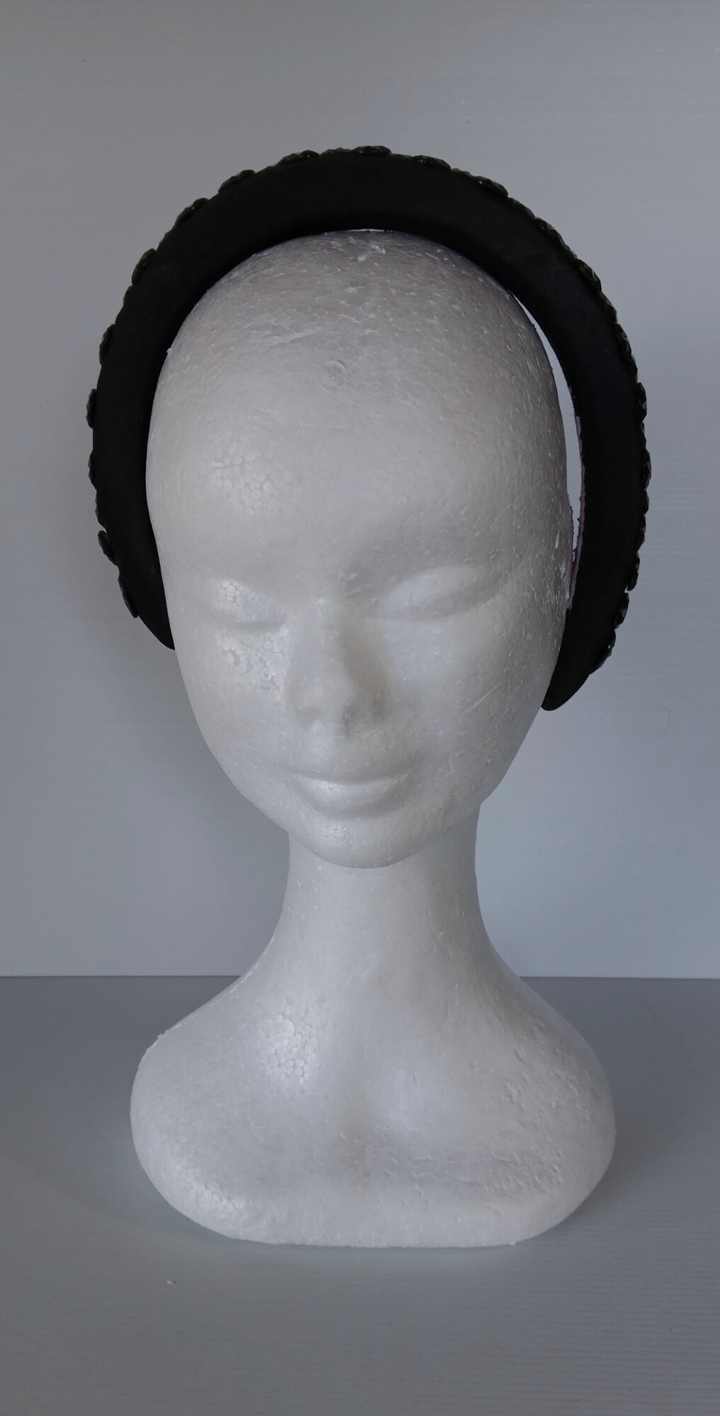 A picture of a Black Padded Headband by Melissa Rath Millinery.