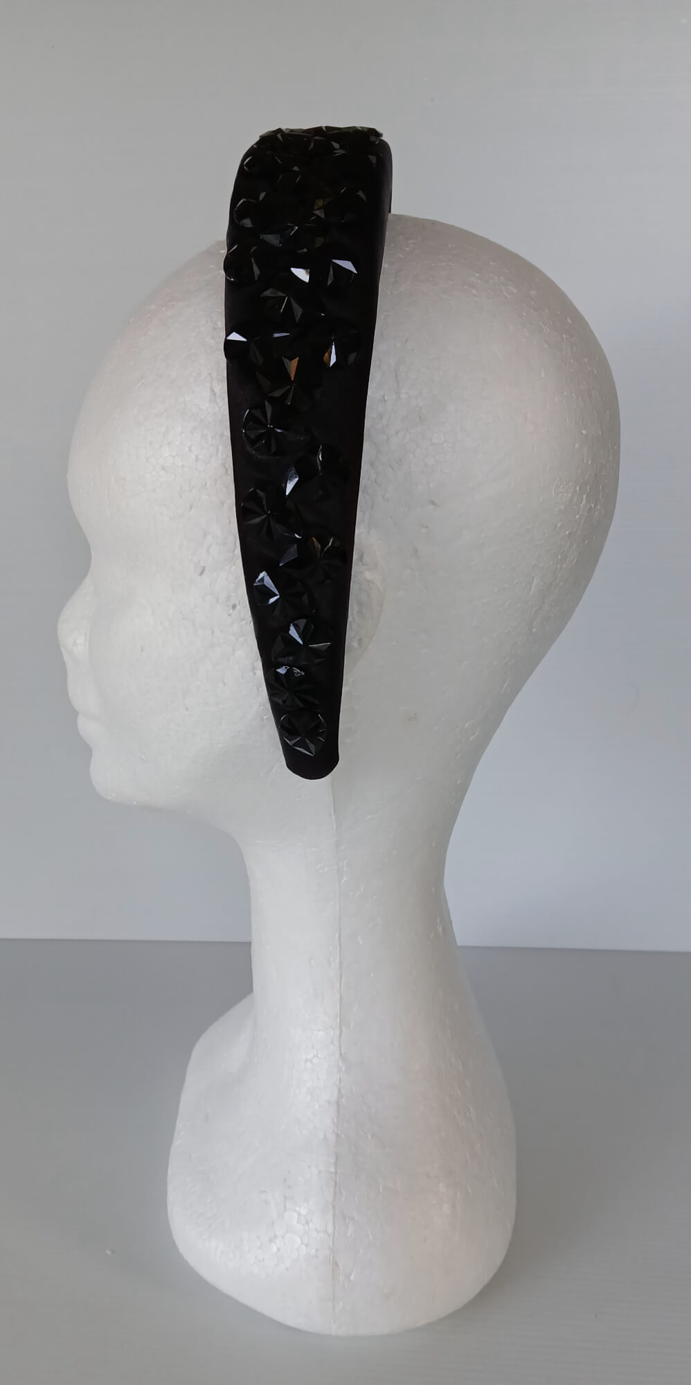 A picture of a Black Padded Headband by Melissa Rath Millinery.