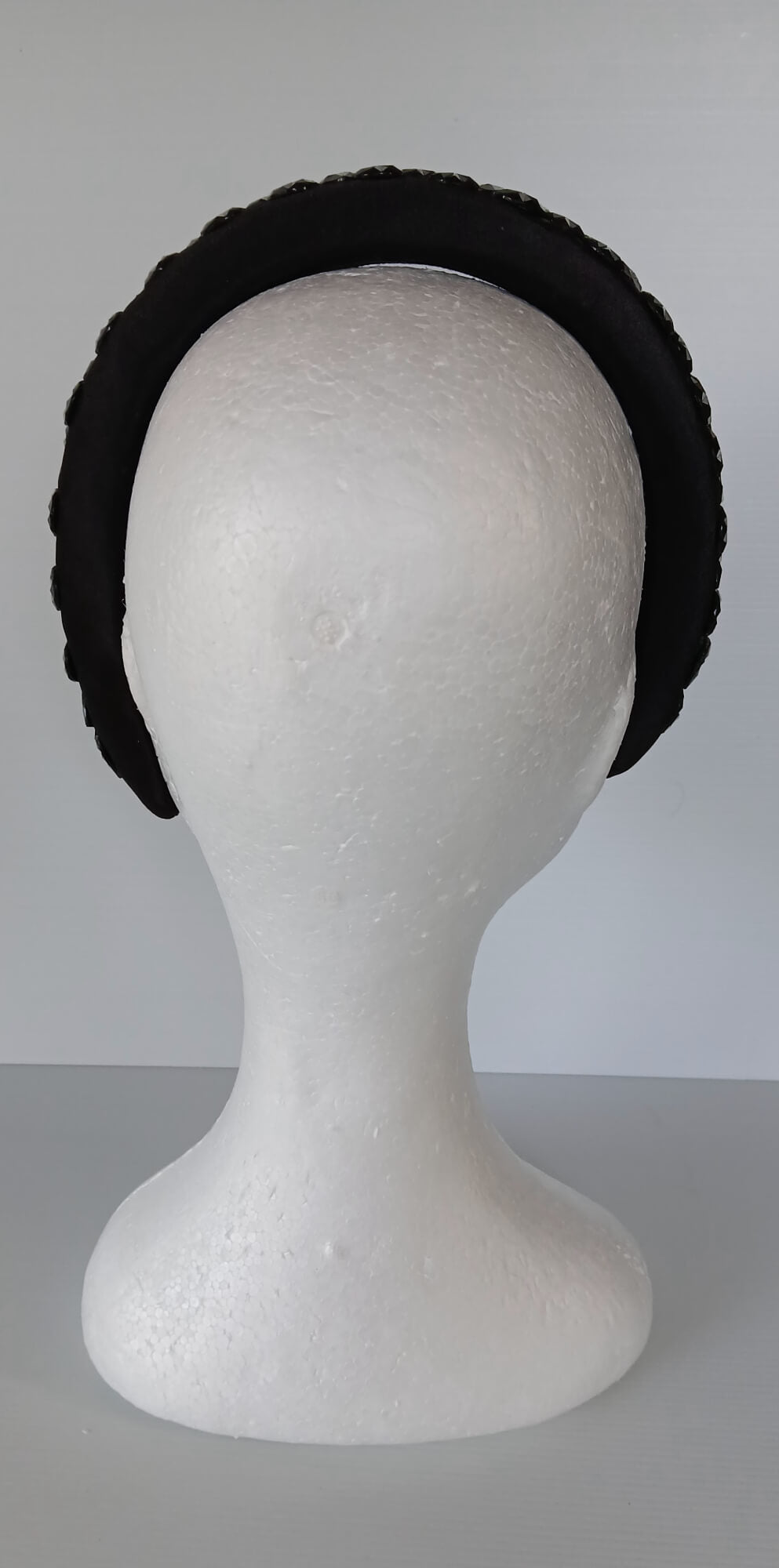 A picture of a Black Padded Headband by Melissa Rath Millinery.