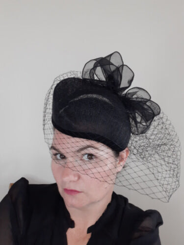 A black Veiled Millinery Beret by Melisa Rath Millinery.